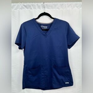 GREY’S ANATOMY CLASSIC AUBREY TOP – 2 POCKET V-NECK TOP IN INDIGO